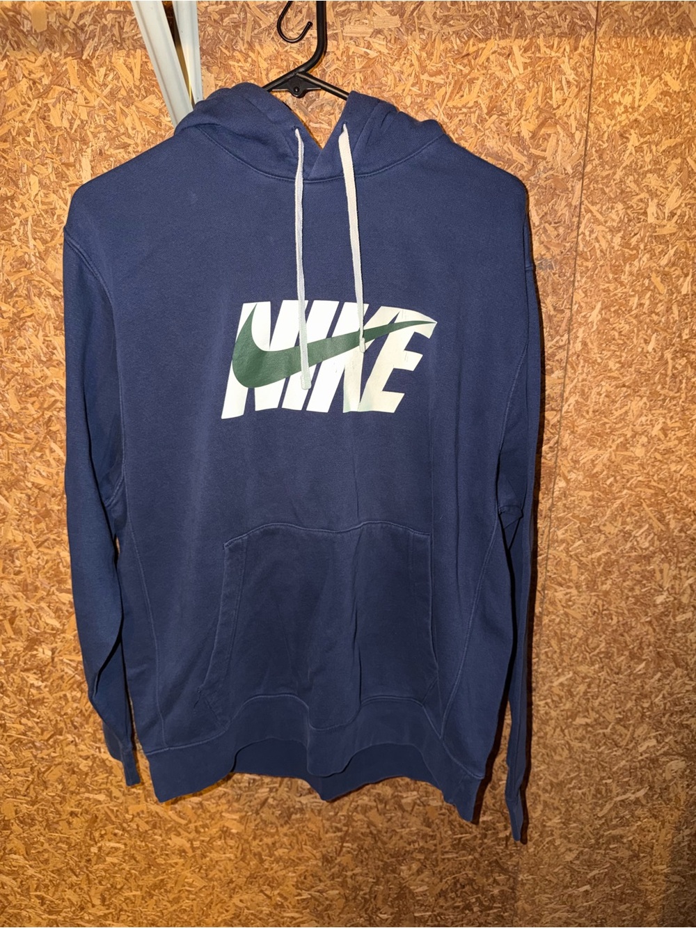 Nike Navy Hoodie with White Drawstrings and Green Logo